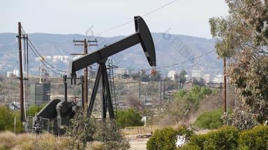 工业城市景观布瑞亚inglewood这些<strong>洛杉矶</strong>泵杰克操作栅栏钻井钻井平台提取原油石油石油矿业机工作活塞石油气体行业